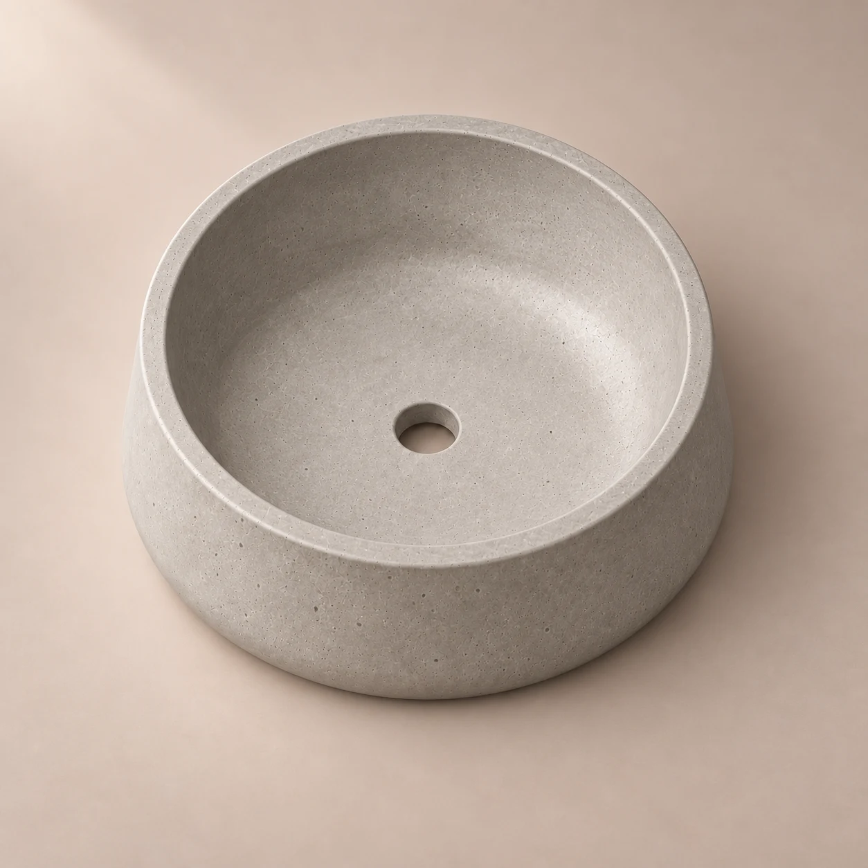 Render de Lavabo Cráter en vista elevada sobre fondo beige cálido